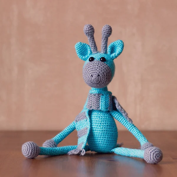 Handmade crochet toy blue giraffe