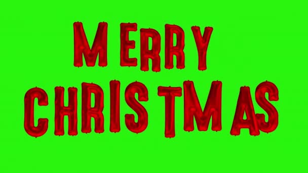 Feliz celebración de Navidad. Globos de papel de aluminio rojo MERRY CHRISTMAS en pantalla verde — Vídeos de Stock