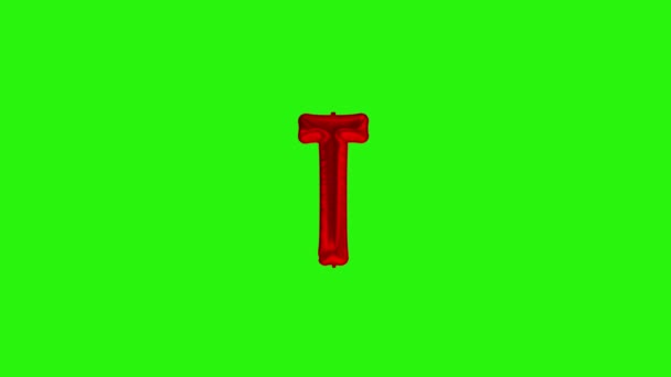Red letter T. Red foil helium balloon alphabet floating on green screen — Stock Video