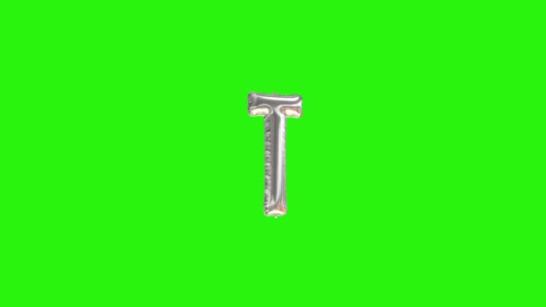 Silver letter T. Silver foil helium balloon alphabet floating on green screen — Stock Video