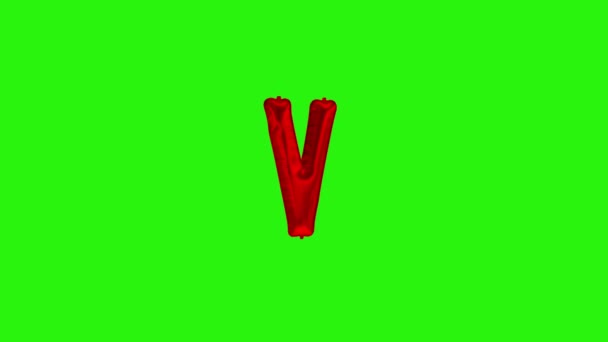 Red letter V. Red foil helium balloon alphabet floating on green screen — ストック動画