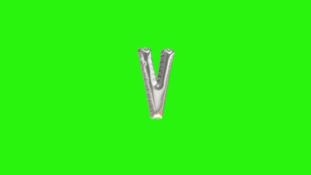 Silver letter V. Silver foil helium balloon alphabet floating on green screen — Stock Video