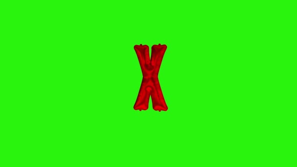Czerwona litera X. Czerwona folia hel balon alfabet pływający na zielonym ekranie — Wideo stockowe