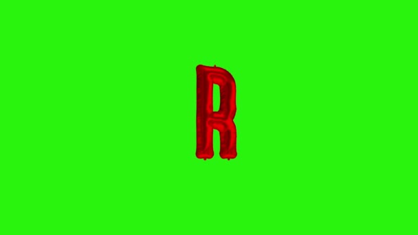 Kırmızı harf R. Kırmızı folyo helyum balonu alfabesi yeşil ekranda yüzüyor. — Stok video