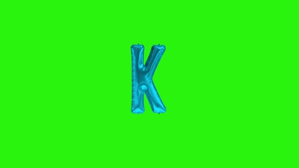 Blue letter K. Blue foil helium balloon alphabet floating on green screen — Stock Video