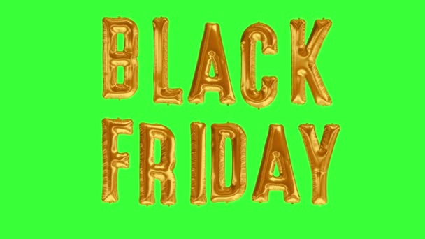 Floating Black Friday made from gold foil balloon on green screen background — Stock Video