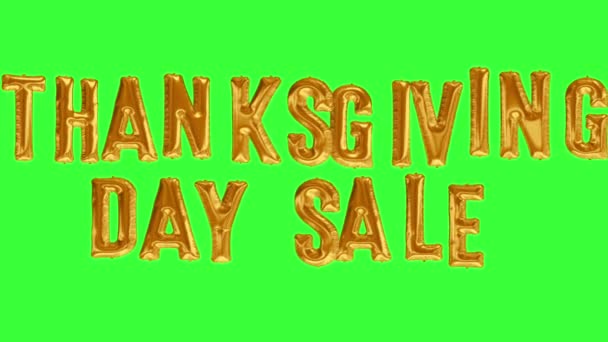 Floating THANKSGIVING DAY SALE made from gold foil balloon on green screen — Stock Video