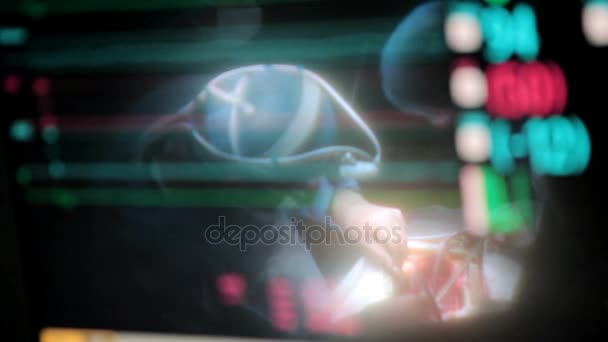 Reflection in the monitor of surgeon doing open heart surgery — Stock Video