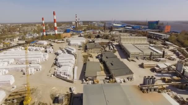 Aerial view of industrial area with factories, warehouses, hangars in the outskirts — Stock Video