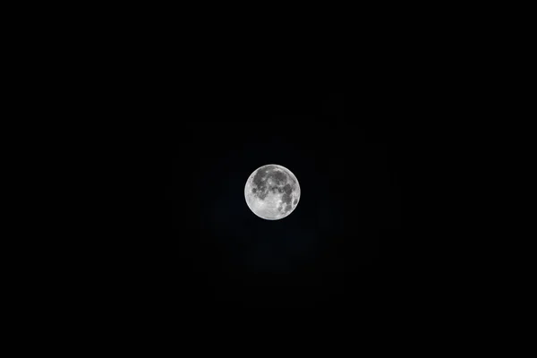 Full moon at black background — ストック写真