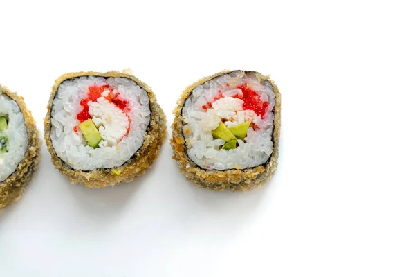 Hot Sushi Roll with salmon, eel, tuna, avocado, royal prawn, cream cheese Philadelphia, caviar tobica, chuka. White background. — Stock Photo, Image