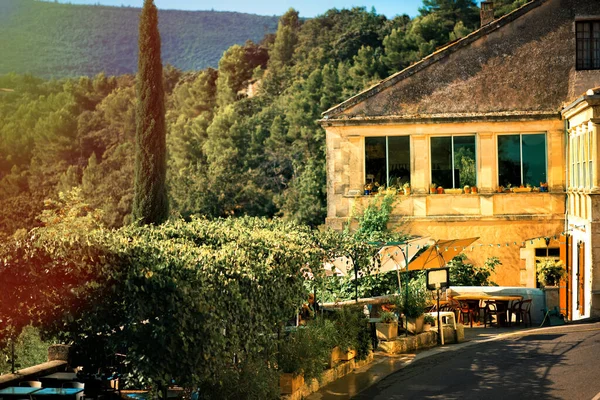 Scenic view of old medieval provencal village Lacoste in Luberon valley, Provence, France. Landscape with yellow stone house. Provence travel tourism destination on Sud of France — Stock Photo, Image