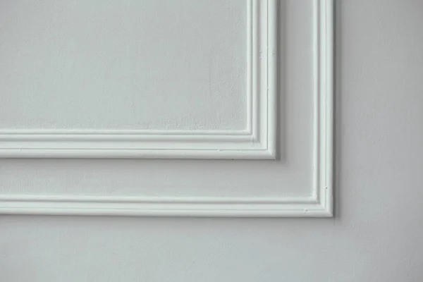 Decorative stucco in the classic interior of the house. The angle of the frame molding white for clipart.
