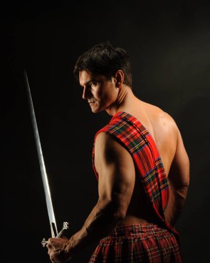 sıcak asker bir İskoçyalı kıyafet giyer