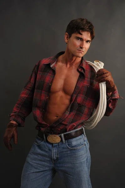 The sexy cowboy awaits — Stock Photo, Image