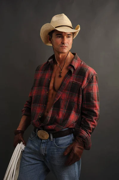The sexy cowboy awaits — Stock Photo, Image