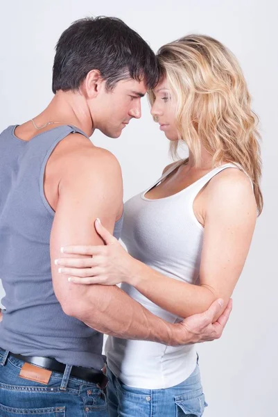 The naughty couple in an embrace — Stock Photo, Image