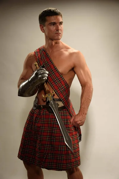 The brawny highlander awaits — Stock Photo, Image