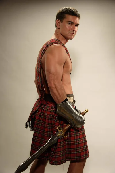 The brawny highlander awaits — Stock Photo, Image