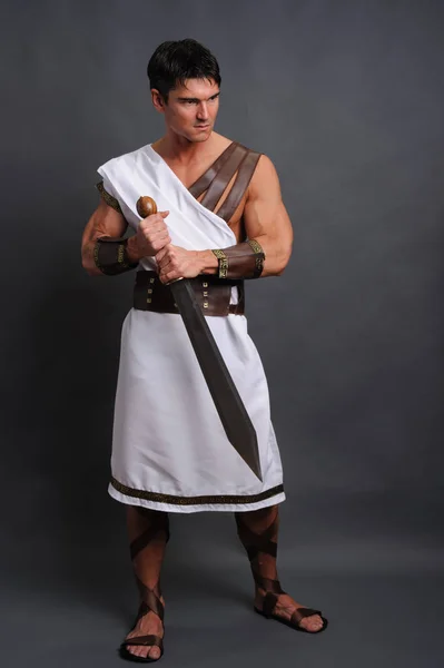 Sexy Gladiator Strikes Pose — Stock Photo, Image