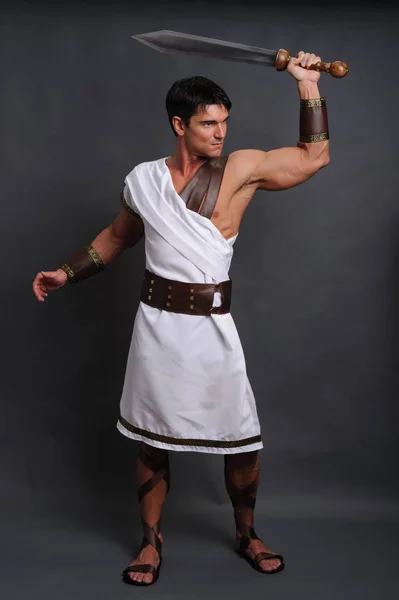 Sexy Gladiator Strikes Pose — Stock Photo, Image