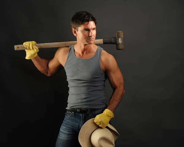 Sexy Cowboy Flexes His Muscles — Stock Photo, Image
