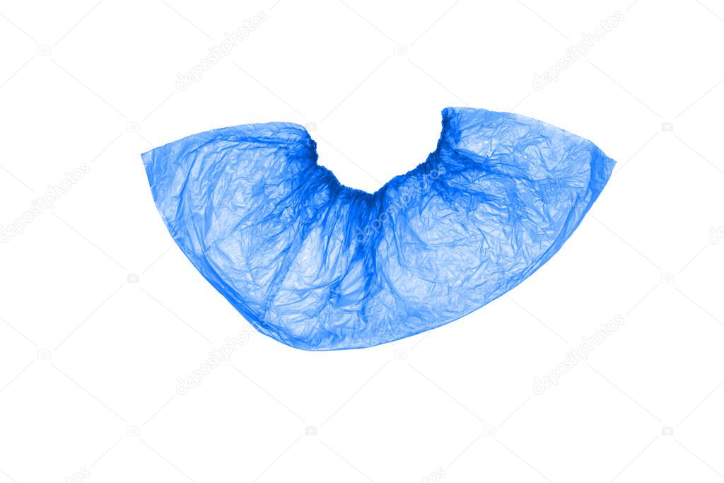 Isolated, disposable, medical Shoe covers in blue on a white background.