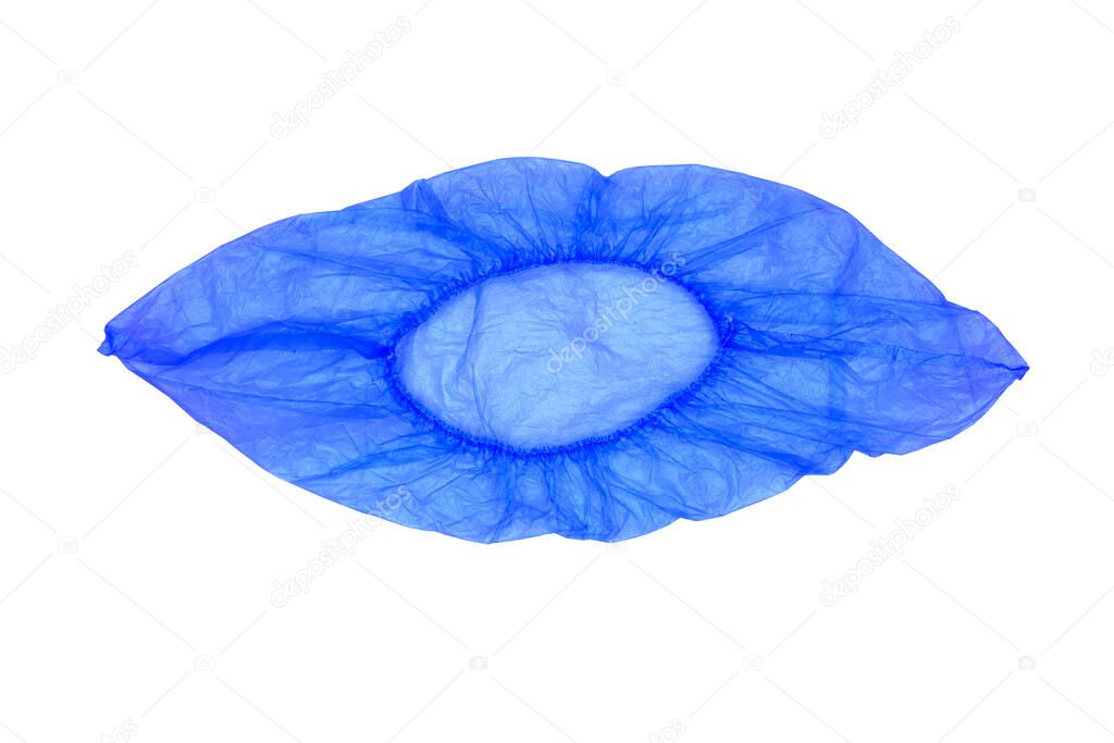 Isolated one medical, blue, disposable Shoe covers on a white background. The view from the top.