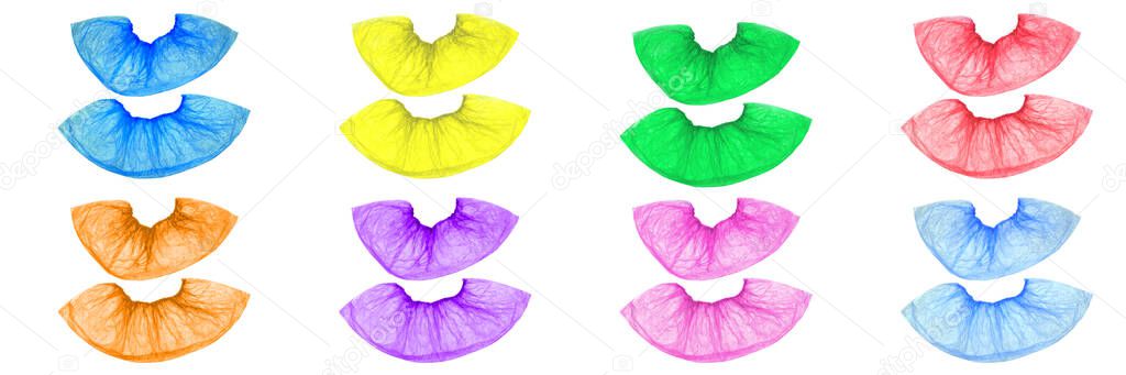 Isolated multi-colored paired Shoe covers of red, pink, purple, green, yellow, orange, blue, and blue on a white background are located under each other.