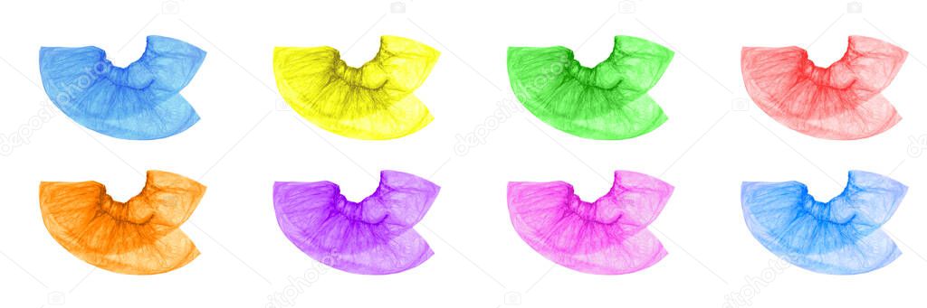 Multi-colored pair of Shoe covers are isolated on a white background. Shoe covers of red, pink, purple, green, yellow, orange, blue, and blue are superimposed on each other.