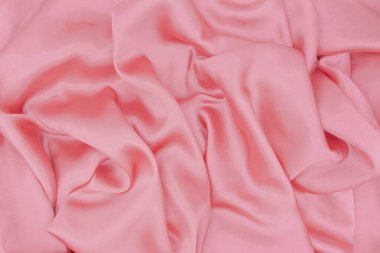 Pürüzsüz, lüks, pembe ipekli ya da saten kumaşlı. Düğün, romantik, soyut bir geçmiş ya da Sevgililer Günü için kullanılabilir..
