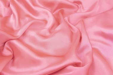 Zarif, pürüzsüz pembe ipek ya da dalgalı saten kumaş. Düğün, romantik ya da aşk geçmişi için kullanılabilir.