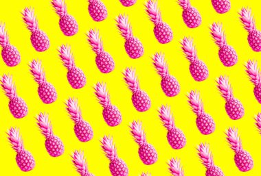 Canlı bir sarı zemin üzerine pembe boyalı ananas