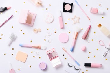 Set of professional decorative cosmetics, makeup tools and accessory on white background. Beauty, fashion and shopping concept. Flat lay composition, top view