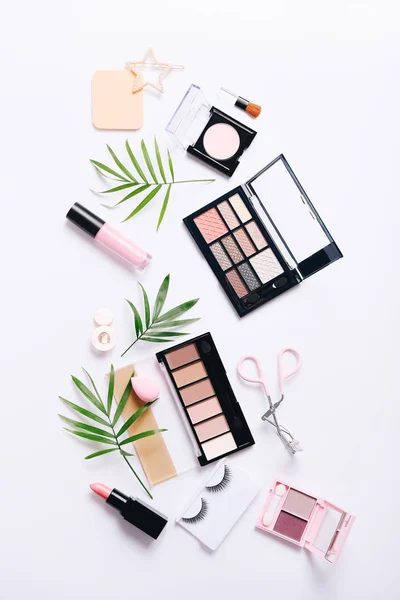 Set of professional decorative cosmetics, makeup tools and accessory on white background. Beauty, fashion and shopping concept. Flat lay composition, top view — Stok fotoğraf