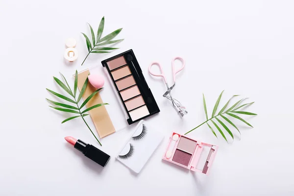 Set of professional decorative cosmetics, makeup tools and accessory on white background. Beauty, fashion and shopping concept. Flat lay composition, top view — 图库照片
