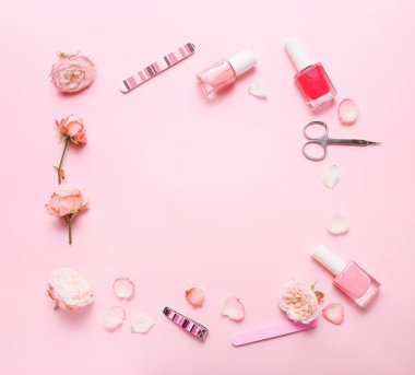 Different tools for manicure on pink background, top view