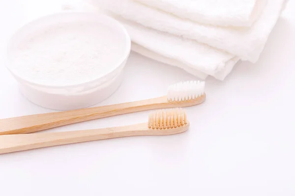 Wooden teeth brushes and tooth-powder on white backgroud. Zero waste concept — Stock Photo, Image