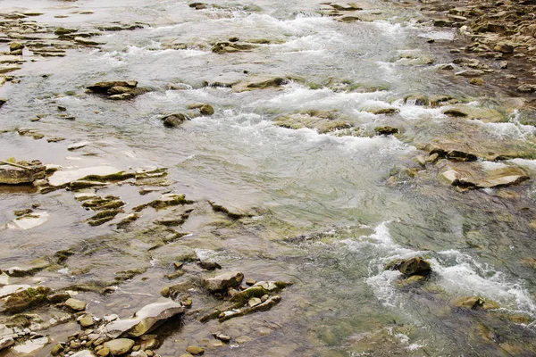 Beautiful Reshi River water flowing through stones and rocks at dawn, — Stock Photo, Image