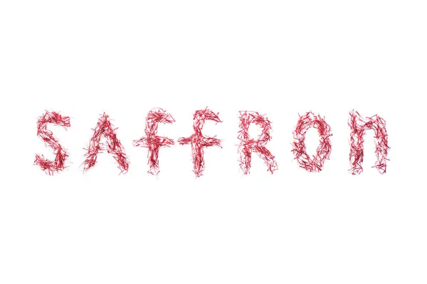 The word saffron is laid out with letters from stitched saffron leaves on a white isolated background. — Stock Image Word Saffron Laid Out Letters Stitched Saffron Leaves White Isolated Royalty Free Stock Images