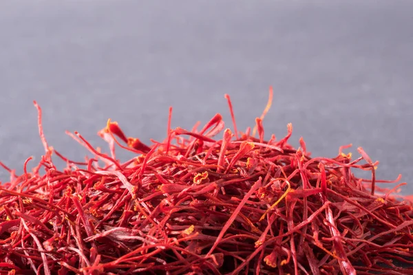 Saffron crocus threads on black background. Close-up. — Stock Image Saffron Crocus Threads Black Background Close Stock Photo