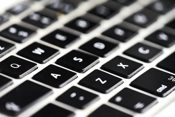 Teclado de um computador portátil. Branco e preto. Macro — Fotografia de Stock