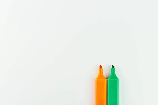 Orange and green marker isolated on white background — Stock Photo, Image