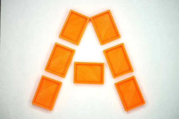 Latin alphabet letter A from orange briks — Stock Photo, Image