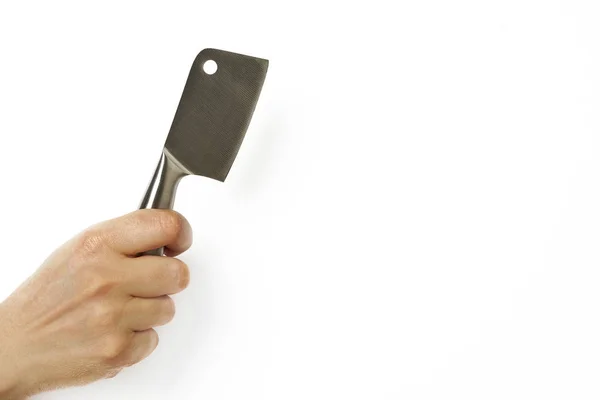 Woman's hand holds cleaver on white background close-up, isolated — Stockfoto