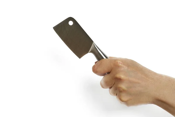 Woman's hand holds cleaver on white background close-up, isolated — Stockfoto