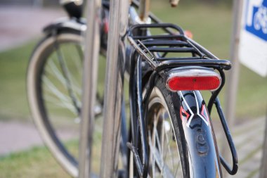 Rear view of bicycle on parking
