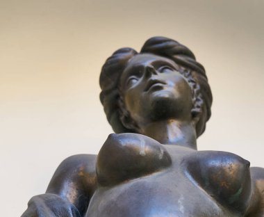 Bronze sculpture woman with naked bust