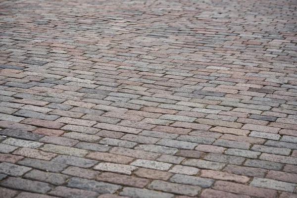 Piedra de pavimentación cubierta de camino vintage. Camino de la tarde en un lugar histórico . — Foto de Stock