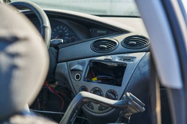 Disassembled dashboard in the car.